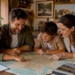 Una famiglia partecipa a un safari educativo, emozionata nell’osservare gli elefanti da vicino.